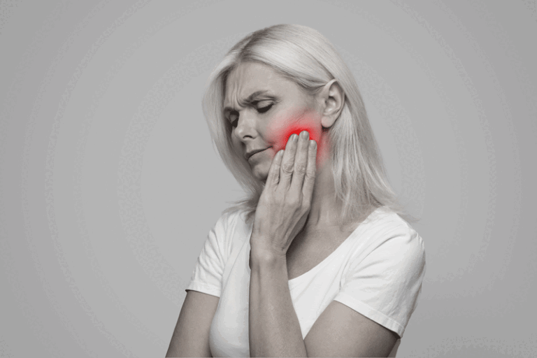 Teeth Problem. Mature Woman Suffering Acute Toothache, Massaging Aching Red Sore Zone, Upset Senior Female Rubbing Jawline